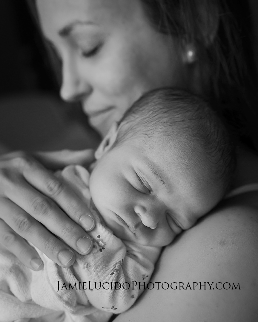 Birth Story Charlotte Newborn Mom with newborn at Charlotte Hospital Birth