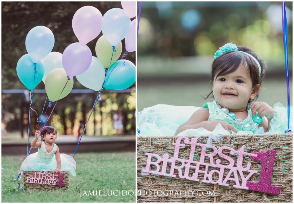 baby in basket, one year portrait, birthday balloons