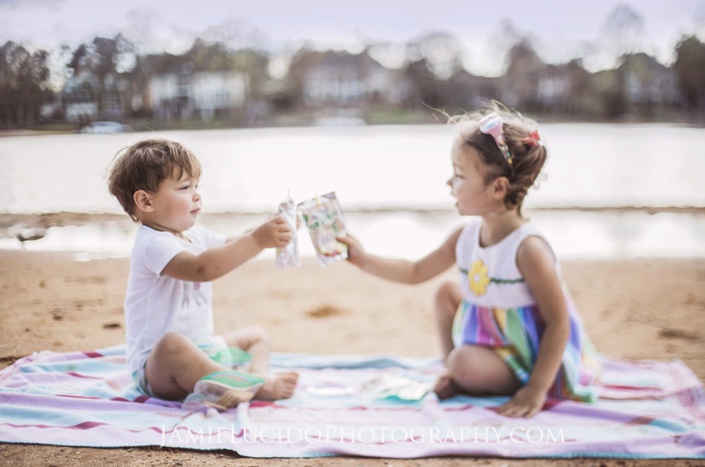 children, picnic at beach, picnic, toddlers eating at beach