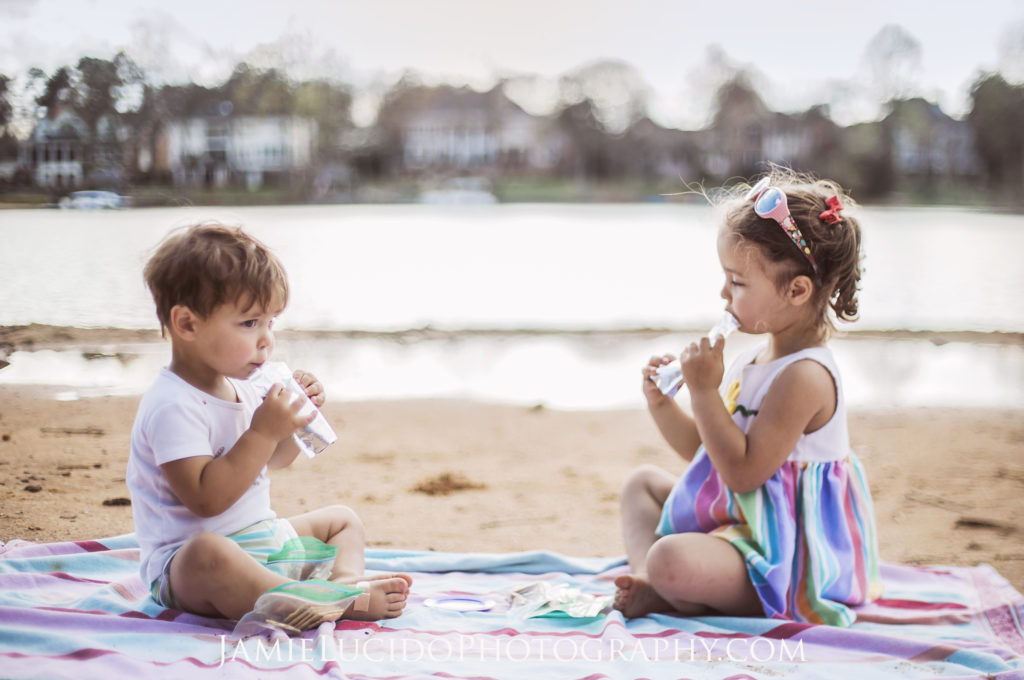 child picnic, children at beach, lunchtime, documentary moment, documentary portrait