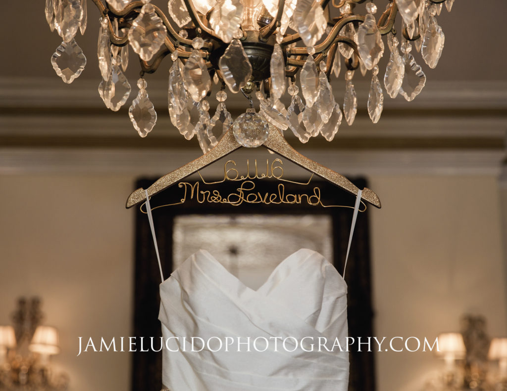 dress with hanger and chandelier