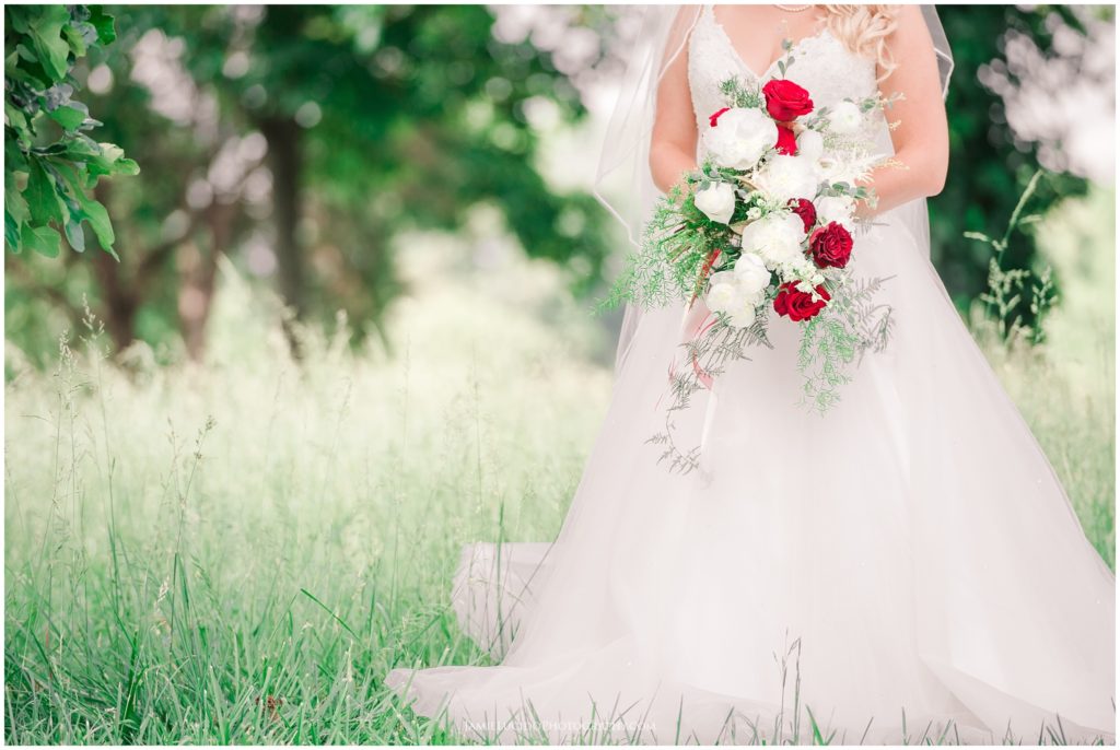 wedding bouquet, red and white bouquet, bride in field