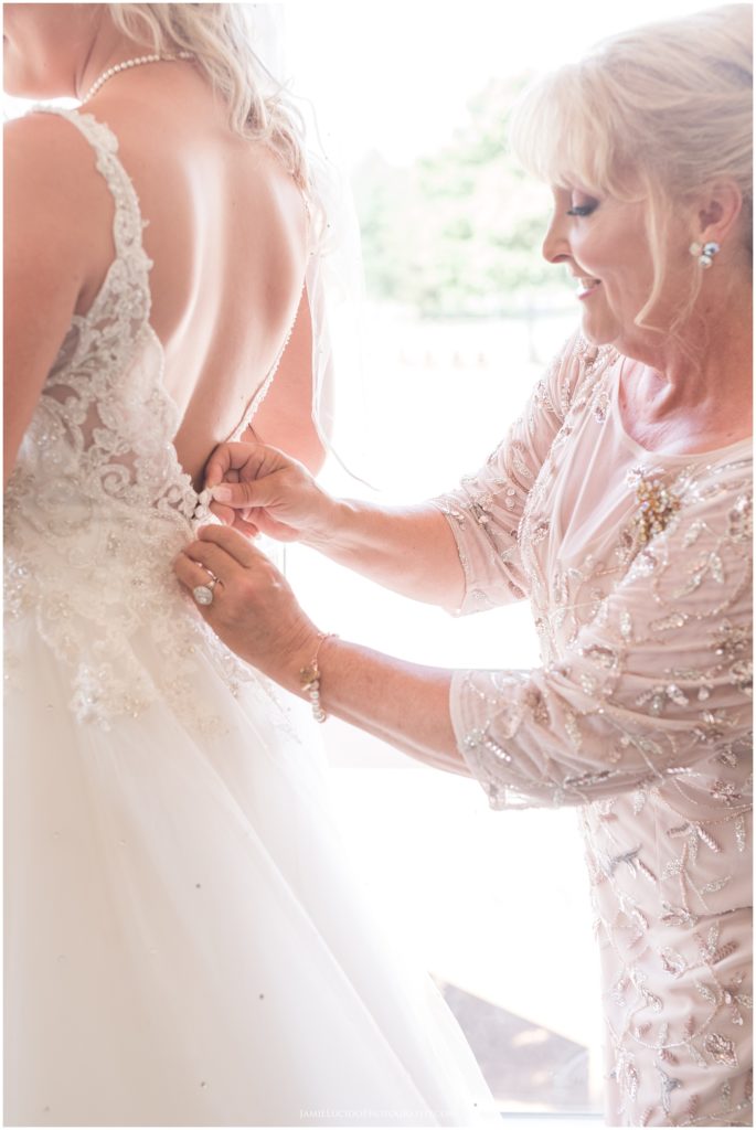 getting into the dress, wedding dress, mother of the bride, wedding photographer, charlotte wedding