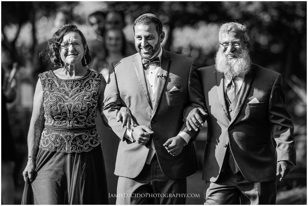 groom and parents, wedding day, walking down the aisle, wedding photography, wedding photography