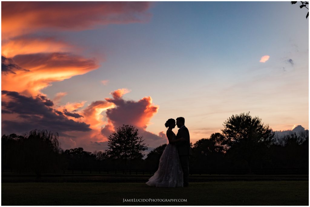 bride and groom, silhouette, wedding photography, creative photographer, cumulo nimbus, sunset clouds, cloud formation, jamie lucido photography 