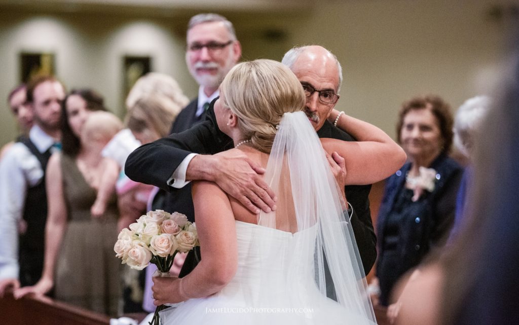 father gives daughter away, catholic wedding