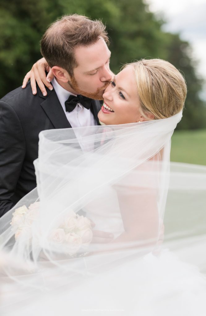 bride and groom with veil, wedding photography with veil, cathedral length veil, charlotte wedding photographer